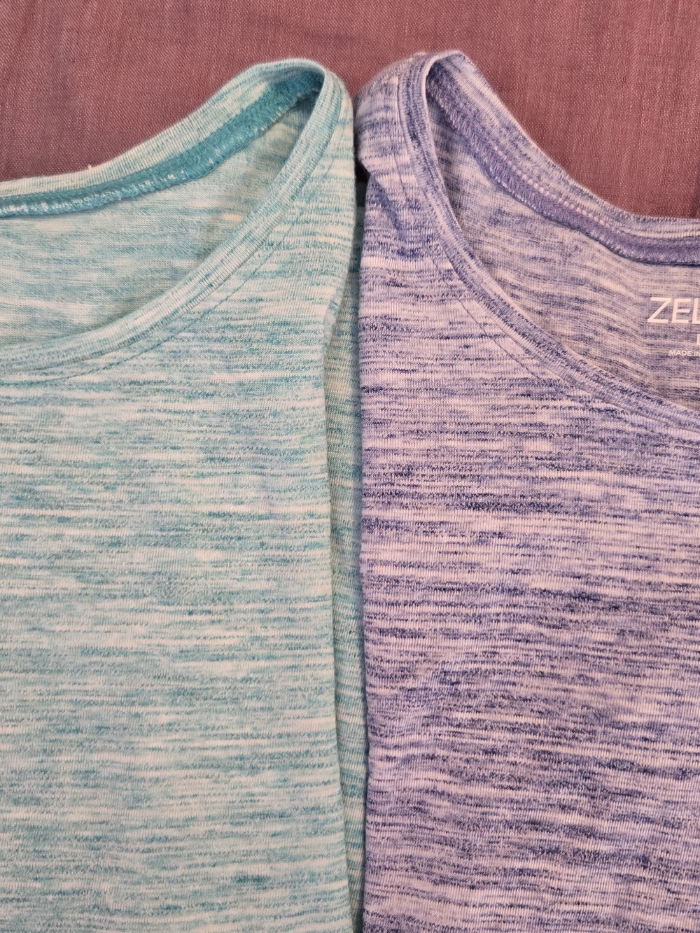 Two ZELOS Heathered Blue and White and Green And White S S Tees. NWT 10